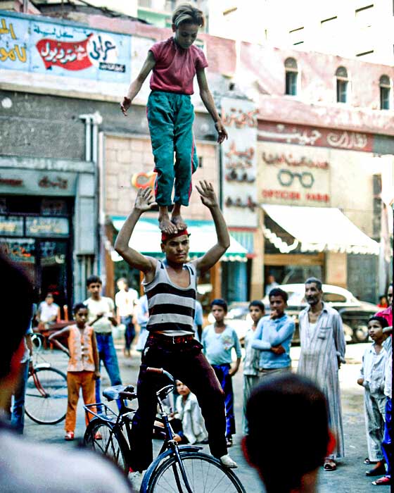 8/7/71StreetCairoEG Classic Portrait: Brothers circus bicycle act balancing for coins, Cairo, Egypt 1971